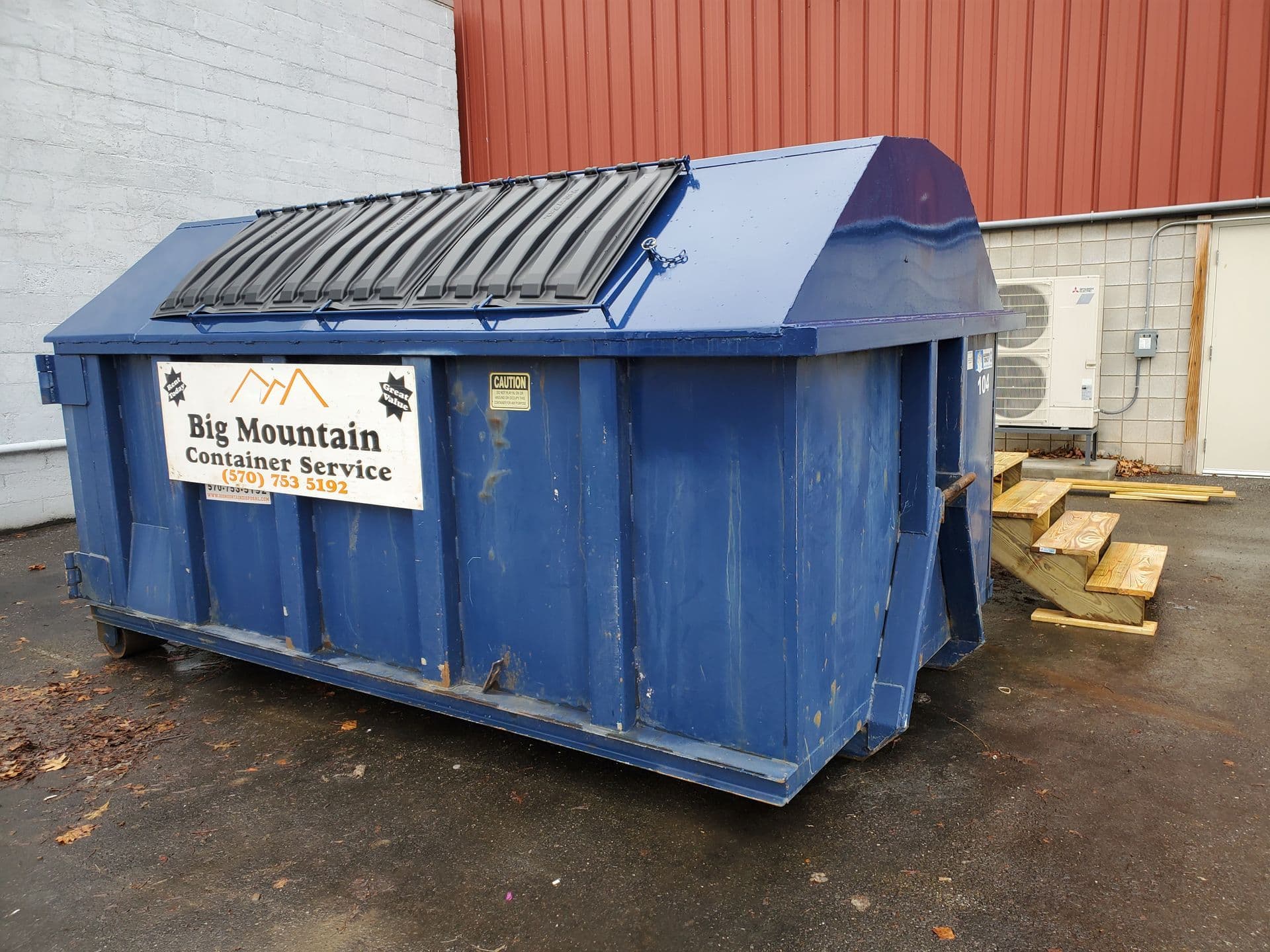 Roll-off dumpster on a Central PA driveway